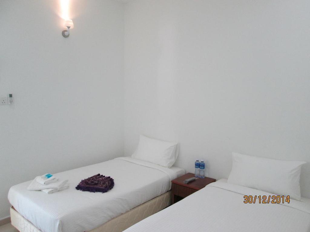 OYO 275 Senyum Inn Pantai Cenang  Exterior foto